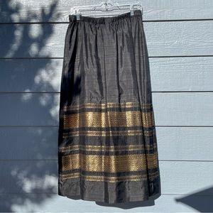 Black raw silk maxi skirt w/gold accents.  EUC